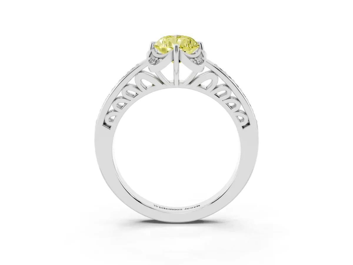 Fancy Yellow Pear Cut Cut Halo Diamond Ring with Channel Set Band and Four-Prong Setting White gold