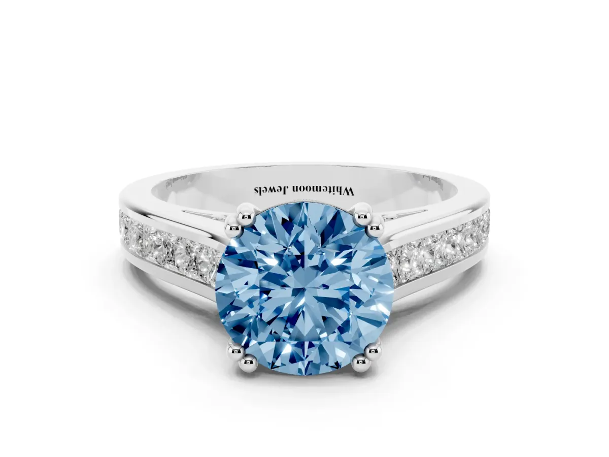 Fancy Blue Round Cut Cut Channel Set Solitaire Engagement Ring with Prong Setting Platinum