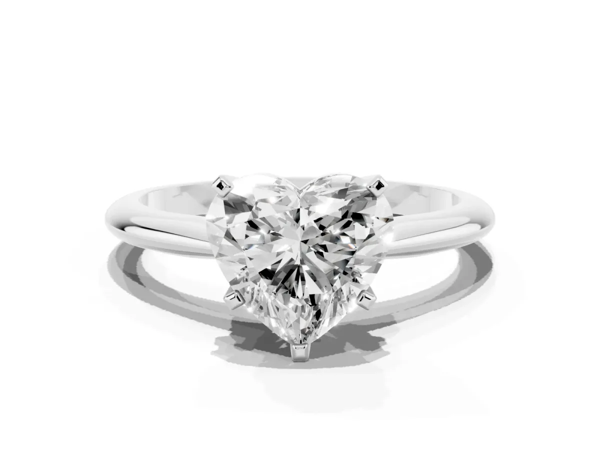 Heart Cut Cut Solitaire Ring with Four-Prong Setting on a Classic Band Silver