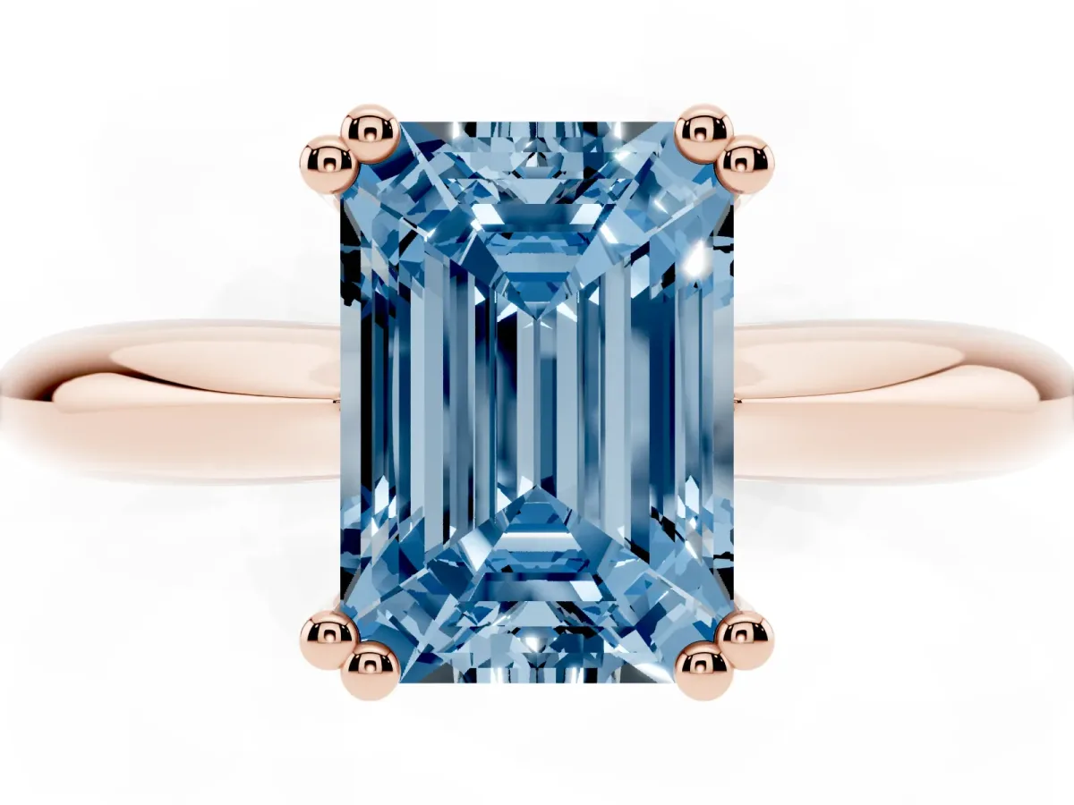 Fancy Blue Emerald Cut Cut Solitaire Engagement Ring with Tapered Band and Four-Prong Setting Rose gold
