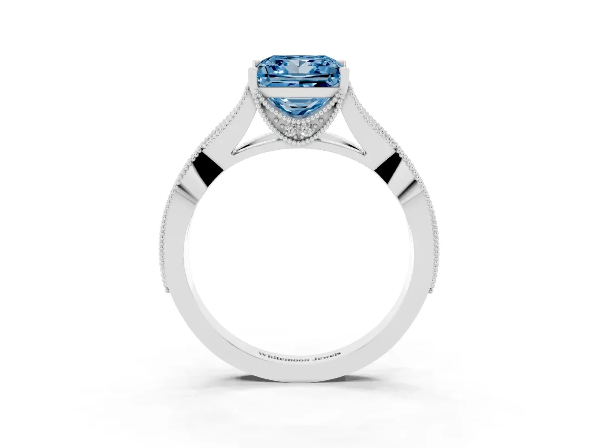 Fancy Blue Princess Cut Cut Diamond Twisted Band with Milgrain Pave Setting and Four-Prong Setting Platinum