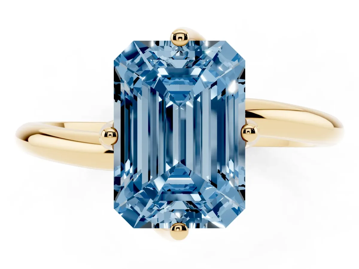 Fancy Blue Emerald Cut Diamond Solitaire Engagement Ring with Four-Prong Setting and Classic Band Yellow gold
