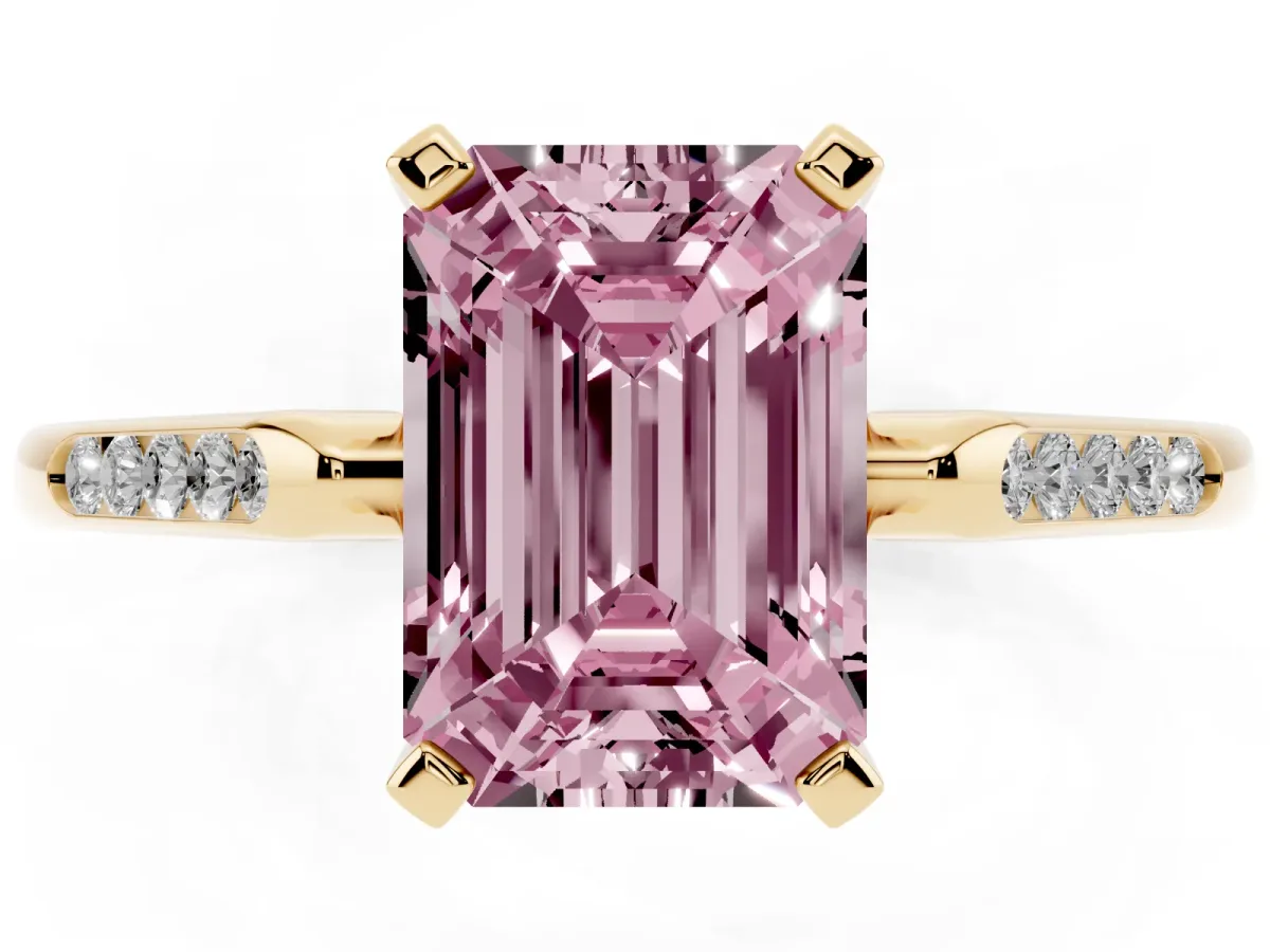 Fancy Pink Emerald Cut Diamond Solitaire Ring with Channel Set Round Band and Prong Setting Yellow gold