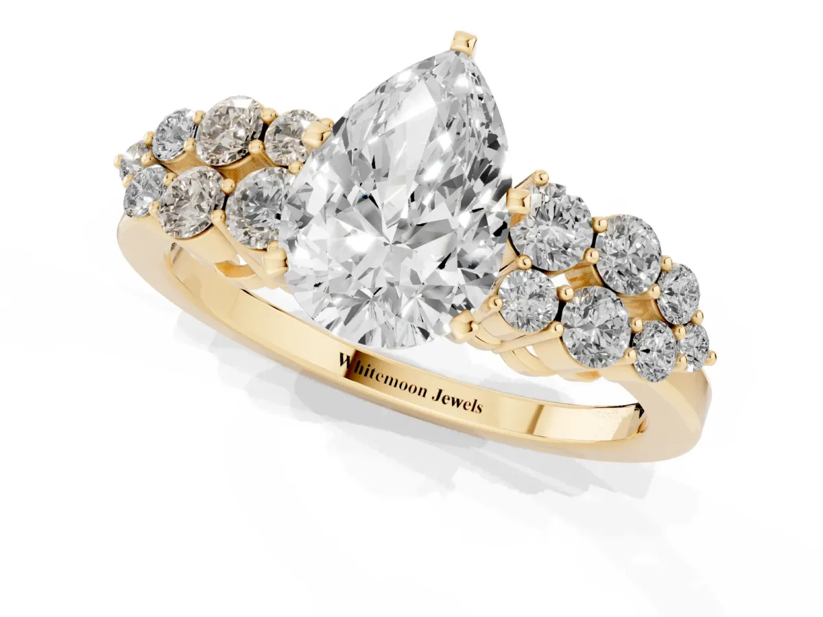 Pear Cut Cluster Diamond Engagement Ring with Pavé Band and Four-Prong Setting Yellow gold