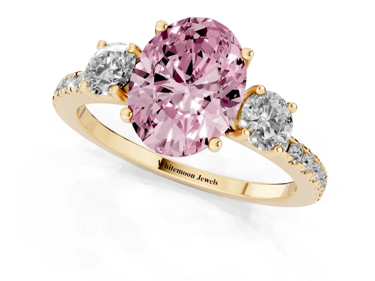 Fancy Pink Three-Stone Oval Cut Cut Diamond Pavé Band with Prong Setting Yellow gold