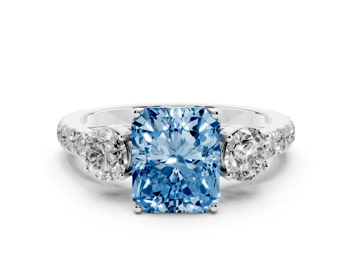 Fancy Blue Radiant Cut Cut Diamond Three-Stone Ring with Round Side Stones and Pavé Band White gold