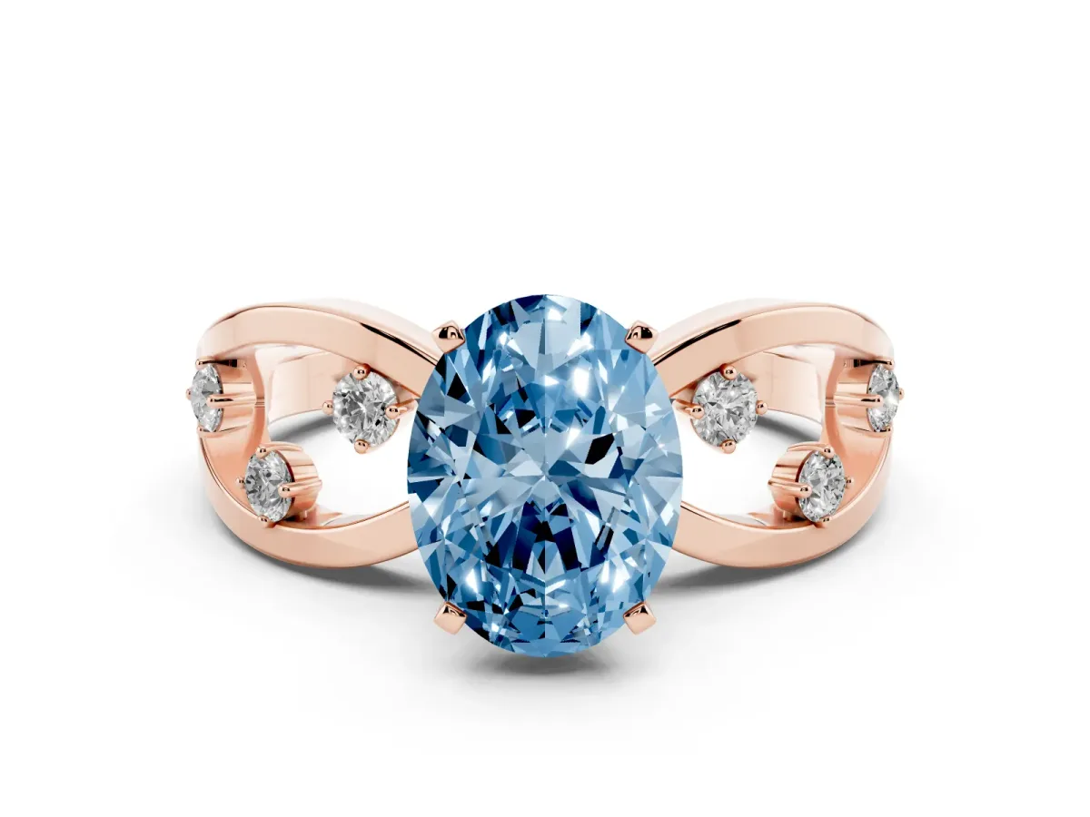 Fancy Blue Oval Cut Cut Solitaire Diamond with Side Stones on Criss-Cross Band and Four-Prong Setting Rose gold