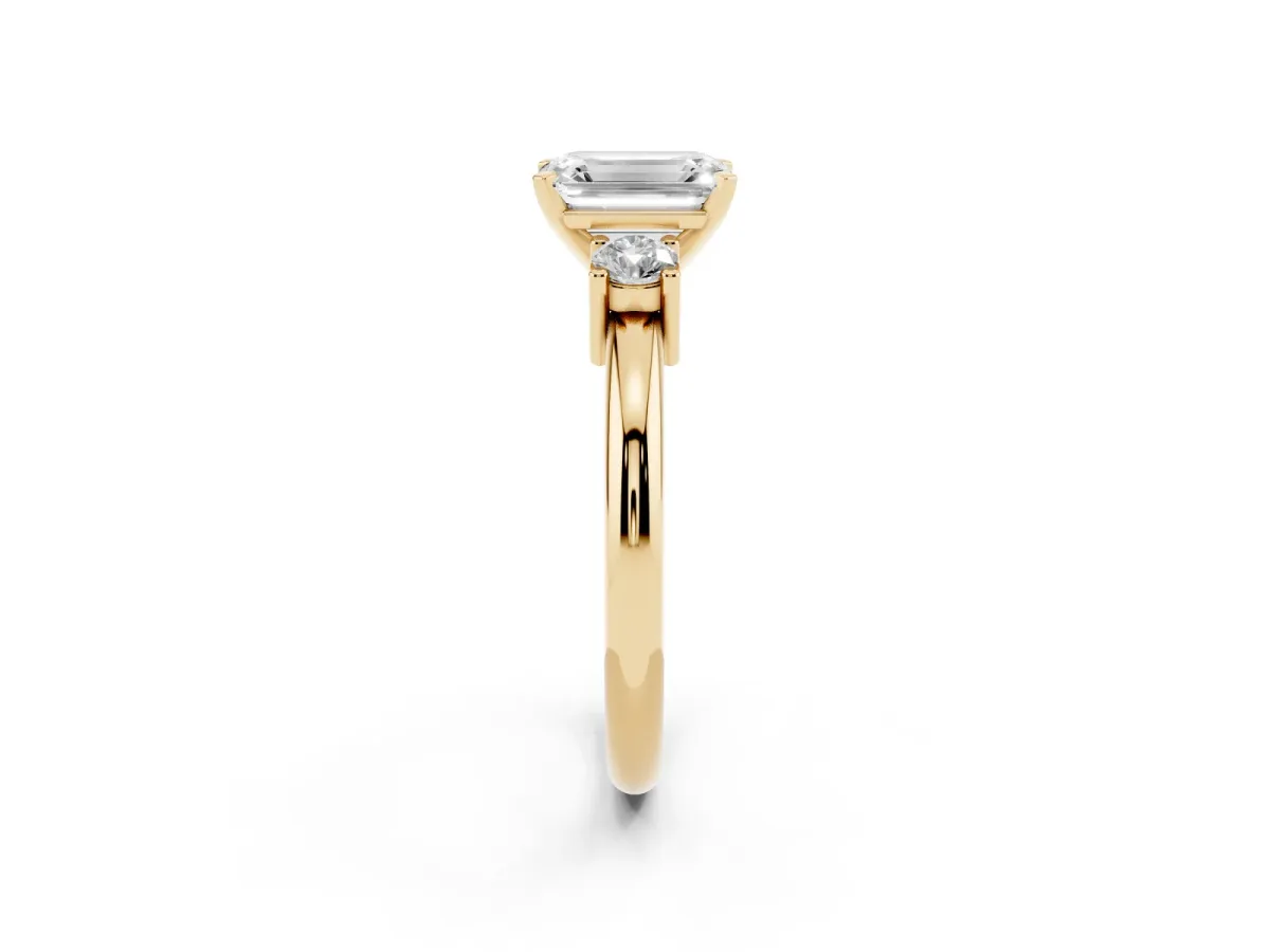 Three-Stone Emerald Cut Cut Diamond Solitaire with Prong Setting and Classic Band Yellow gold
