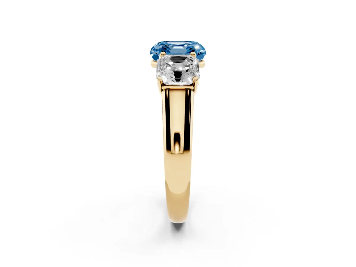 Fancy Blue Asscher Cut Three-Stone Diamond Ring with Prong Setting on a Classic Band Yellow gold