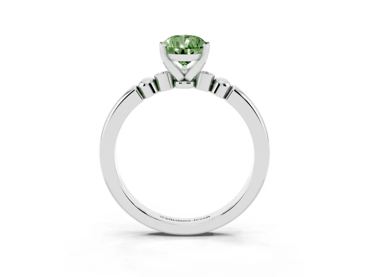 Fancy Green Pear Cut Solitaire Beaded Band with Four-Prong Setting Silver