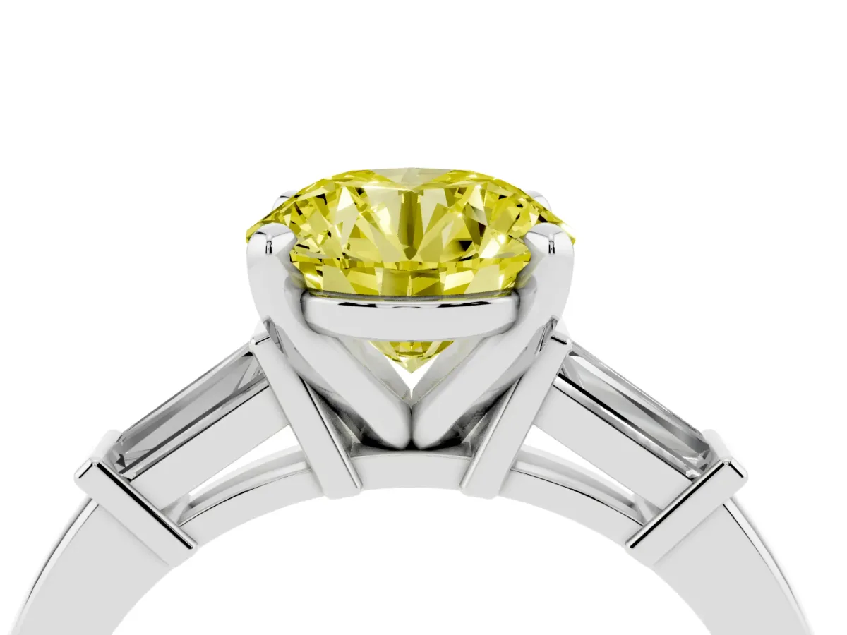Fancy Yellow Round Cut Cut Diamond Solitaire Ring with Tapered Baguette Accents and Four-Prong Setting White gold