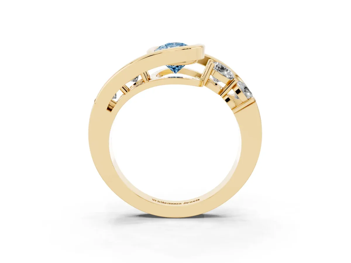 Fancy Blue Bezel Set Pear Cut Diamond Bypass Ring with Round Accents Yellow gold