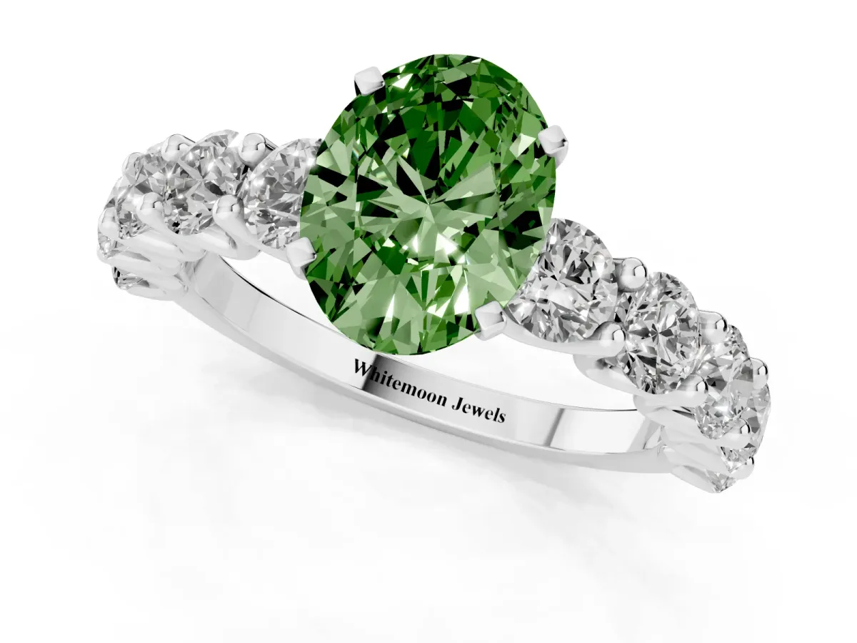 Fancy Green Oval Cut Diamond Prong Setting with Side Stones on a Pave Band Silver
