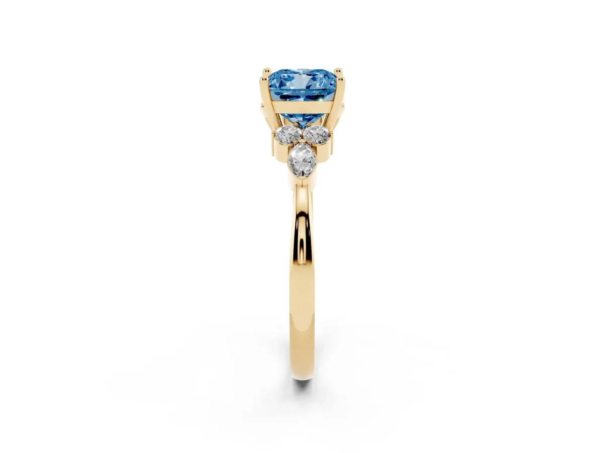 Fancy Blue Cushion Cut Brilliant Diamond Solitaire Ring with Pear Side Stones and Four-Prong Setting Yellow gold