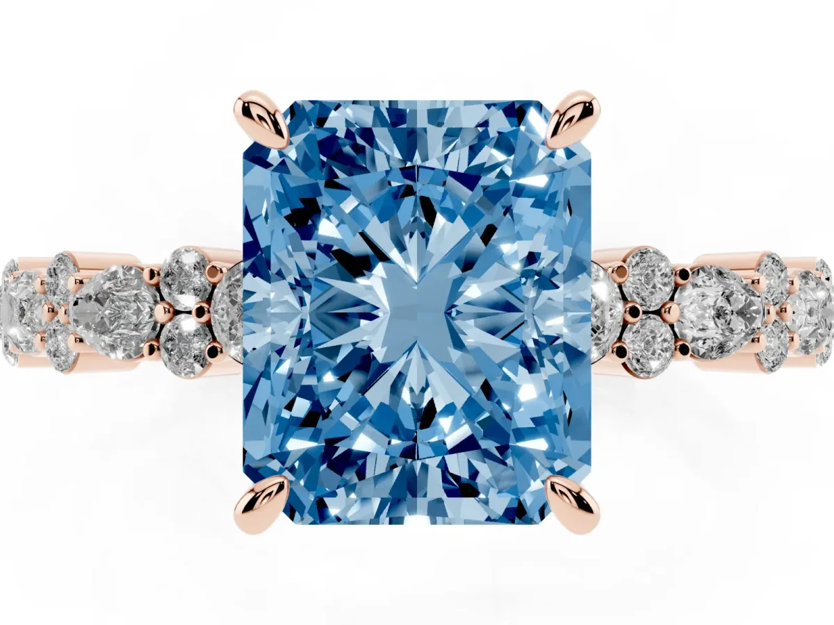 Fancy Blue Radiant Cut Diamond Side Stone Solitaire Ring with Round and Four-Prong Setting Rose gold