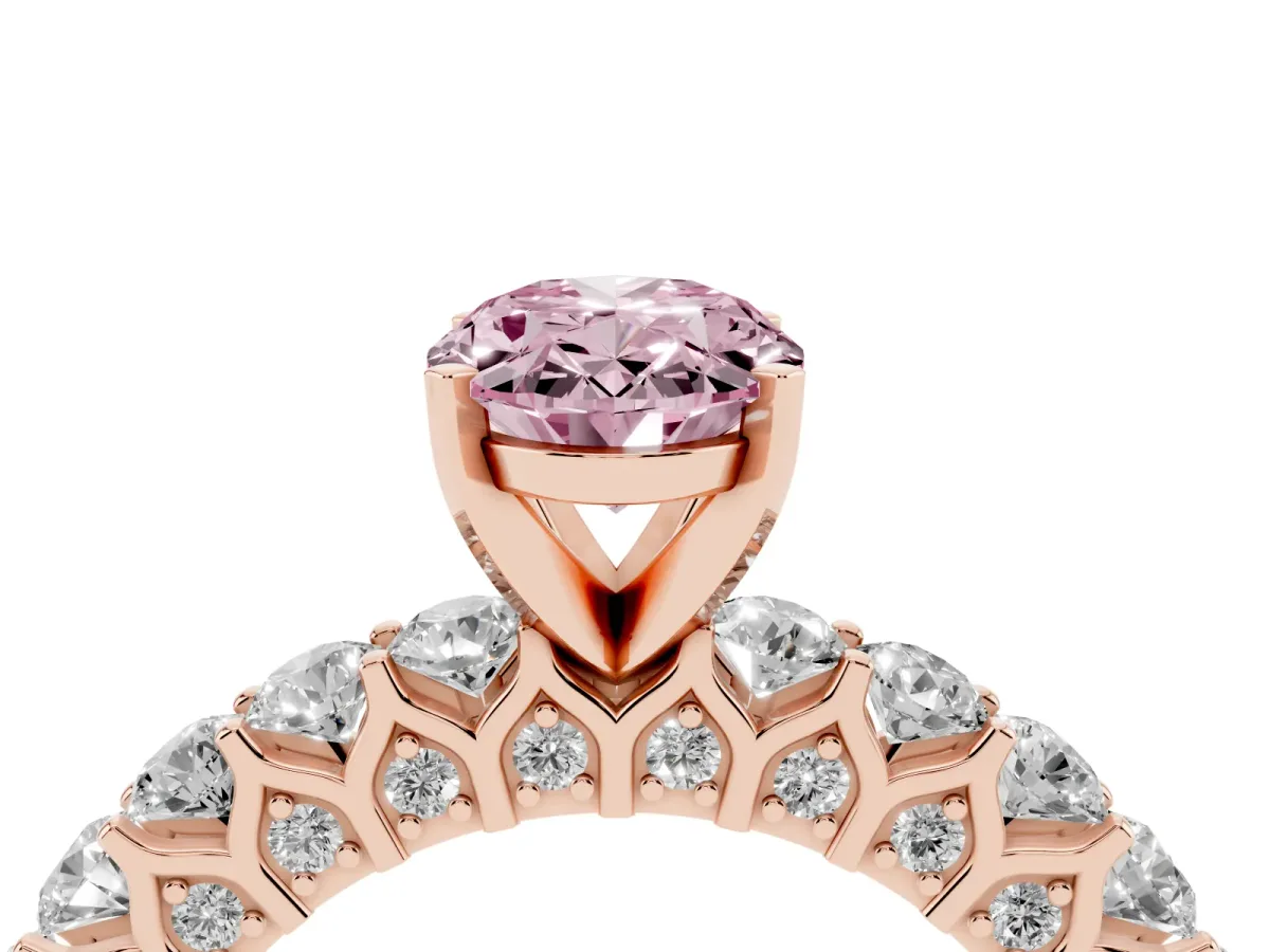 Fancy Pink Oval Cut Diamond Solitaire Ring with Shared Prong Pavé Band and Four-Prong Setting Rose gold