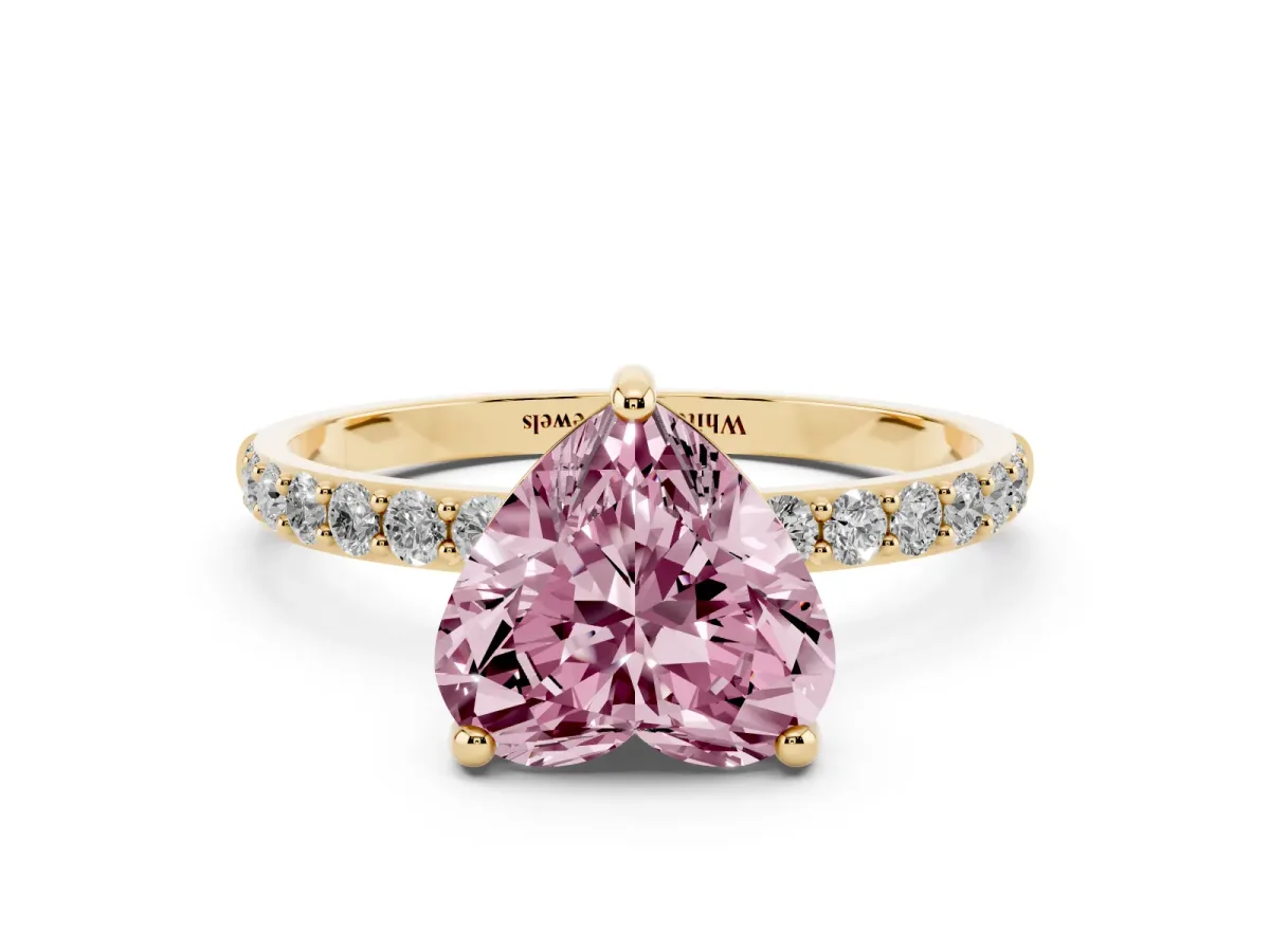 Fancy Pink Heart Cut Diamond Solitaire Ring with Round Pavé Band and Prong Setting Yellow gold