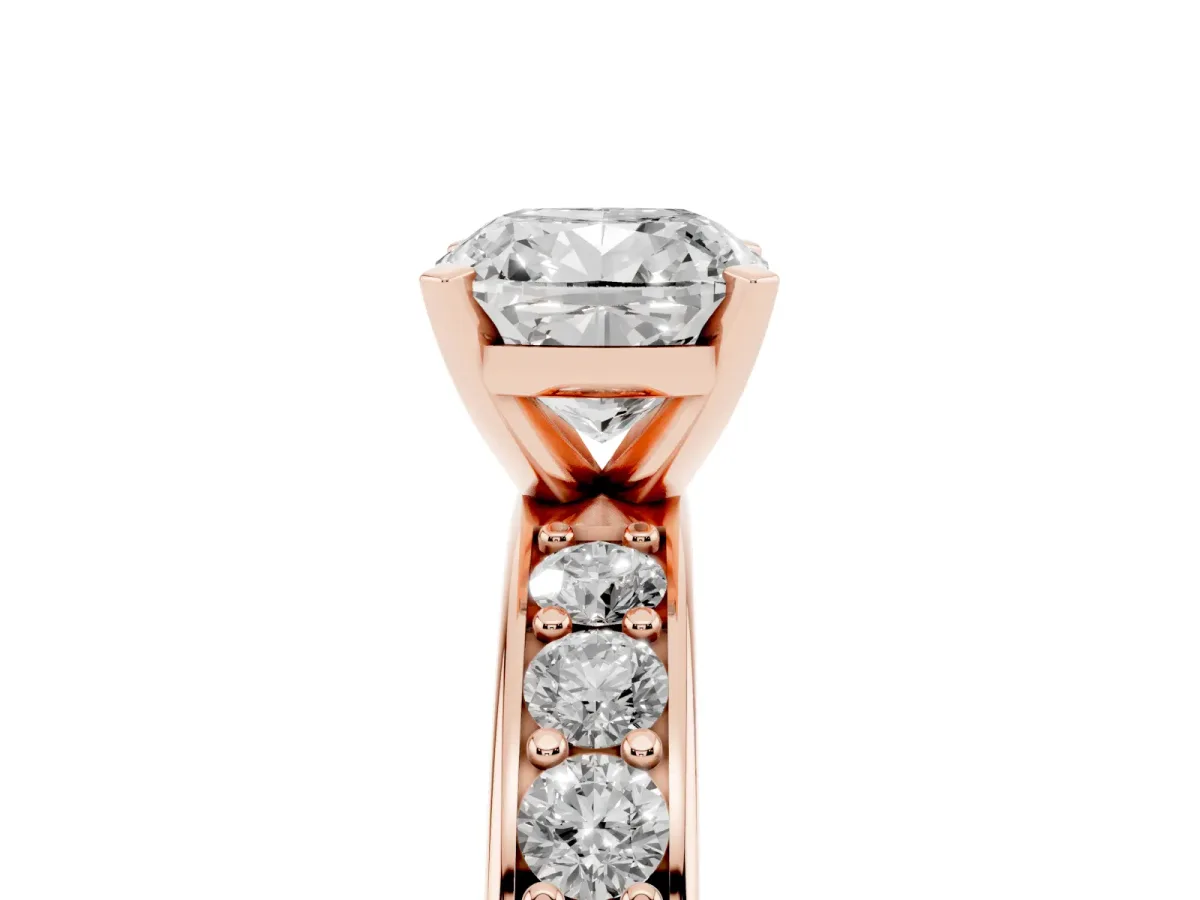Cushion Cut Diamond Engagement Ring with Channel Set Round Band and Prong Setting Rose gold