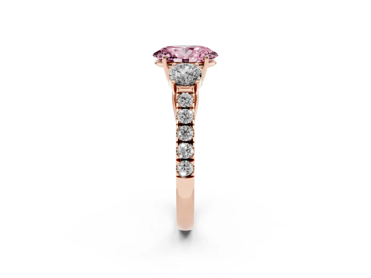 Fancy Pink Oval Cut Cut Diamond Three-Stone Ring with Round Side Stones and Pavé Band Rose gold