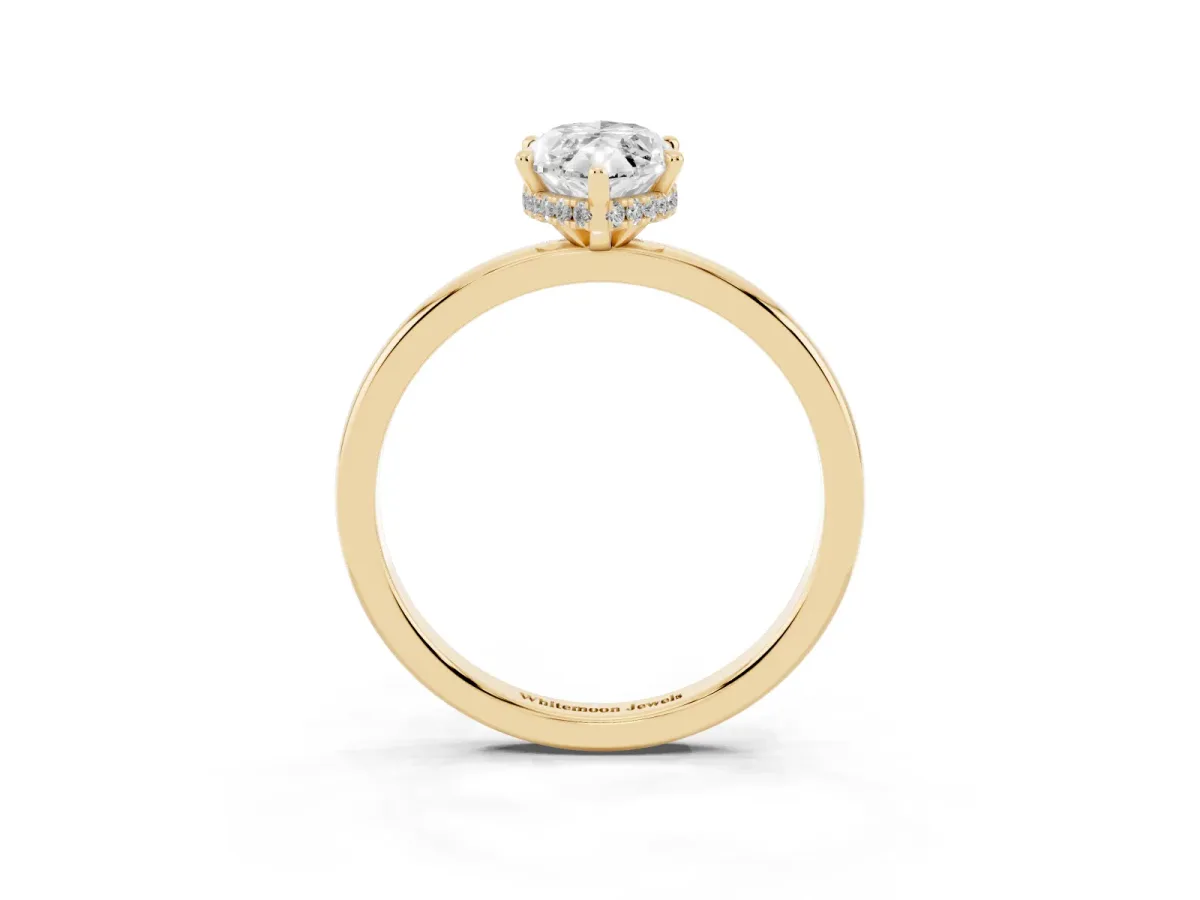 Marquise Cut Solitaire Engagement Ring with Cathedral Band and Four-Prong Setting Yellow gold