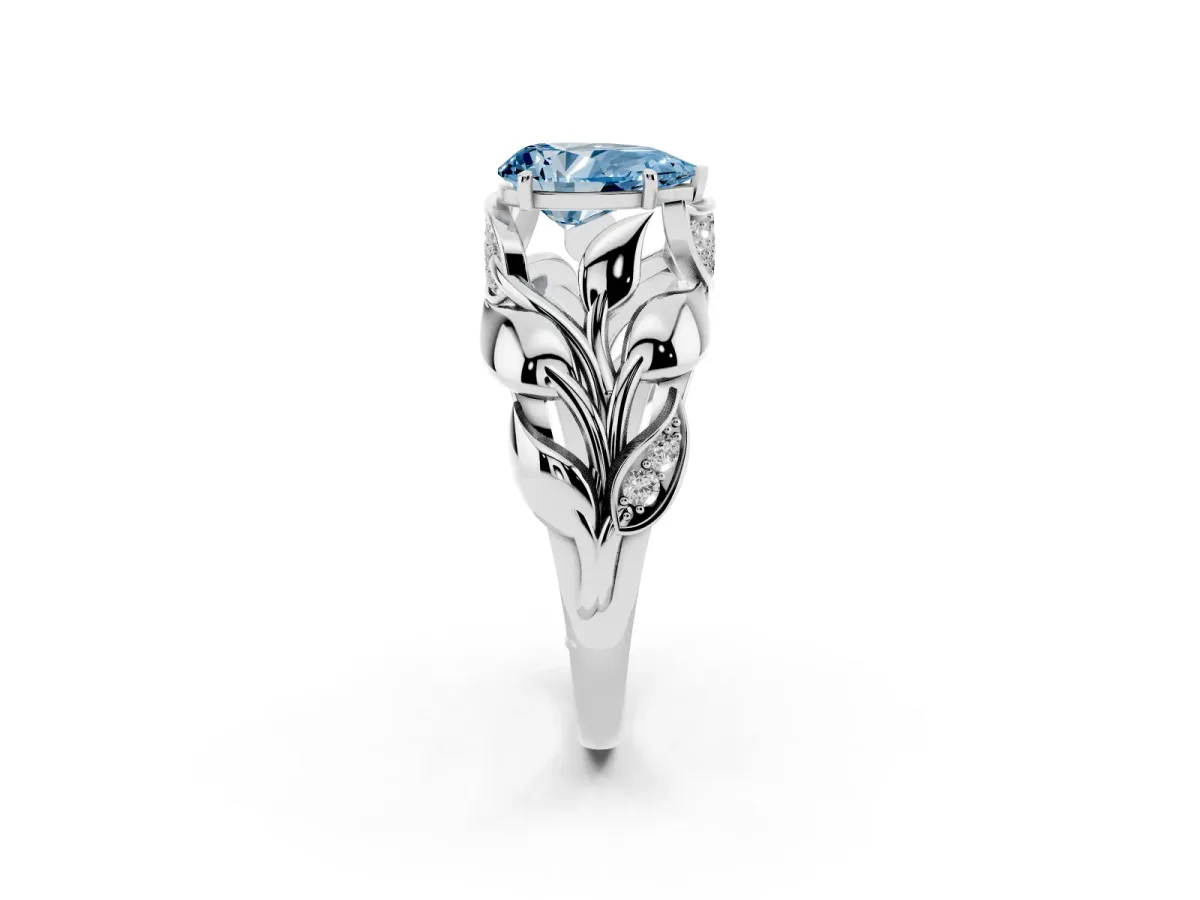 Fancy Blue Pear Cut Diamond Leaf-Inspired Engagement Ring with Round Accents and Prong Setting Silver