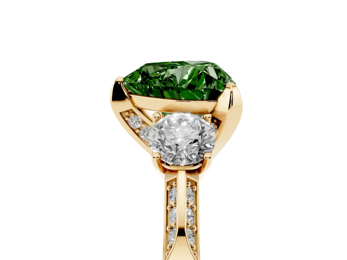 Fancy Green Heart Cut Brilliant Three-Stone Diamond Ring with Pavé Band and Four-Prong Setting Yellow gold