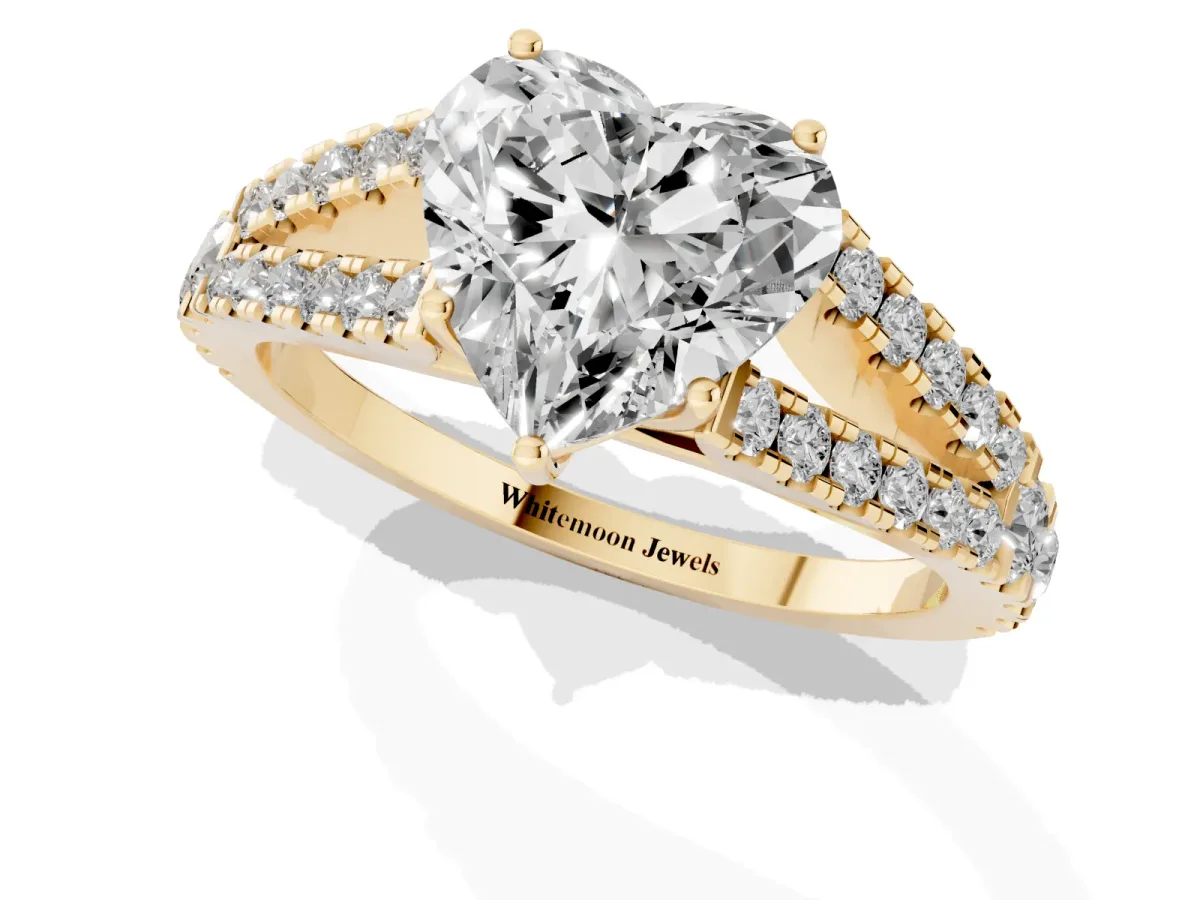 Heart Cut Diamond Split Shank Engagement Ring with Round Pavé and Prong Setting Yellow gold