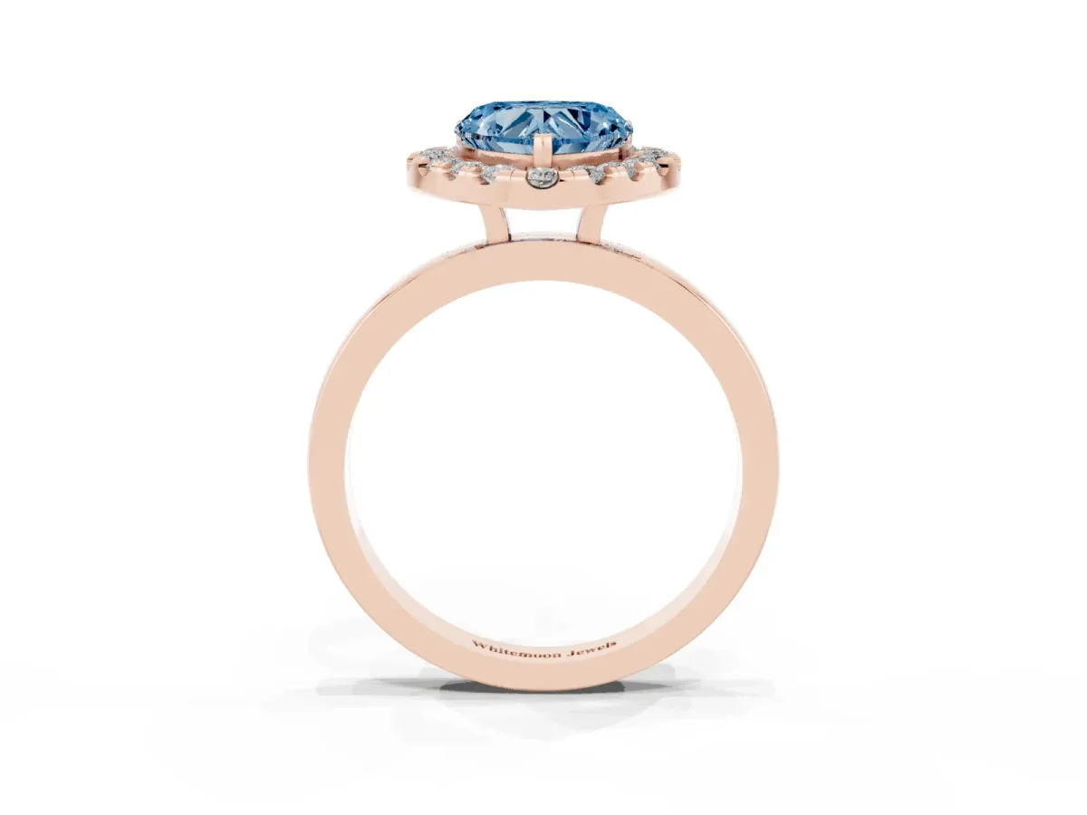 Fancy Blue Heart Cut Halo Diamond Solitaire with Pavé Band and Four-Prong Setting Rose gold