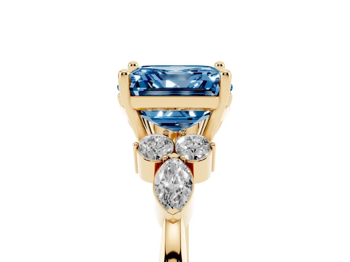 Fancy Blue Asscher Cut Brilliant Diamond Solitaire Ring with Pear Side Stones and Four-Prong Setting Yellow gold
