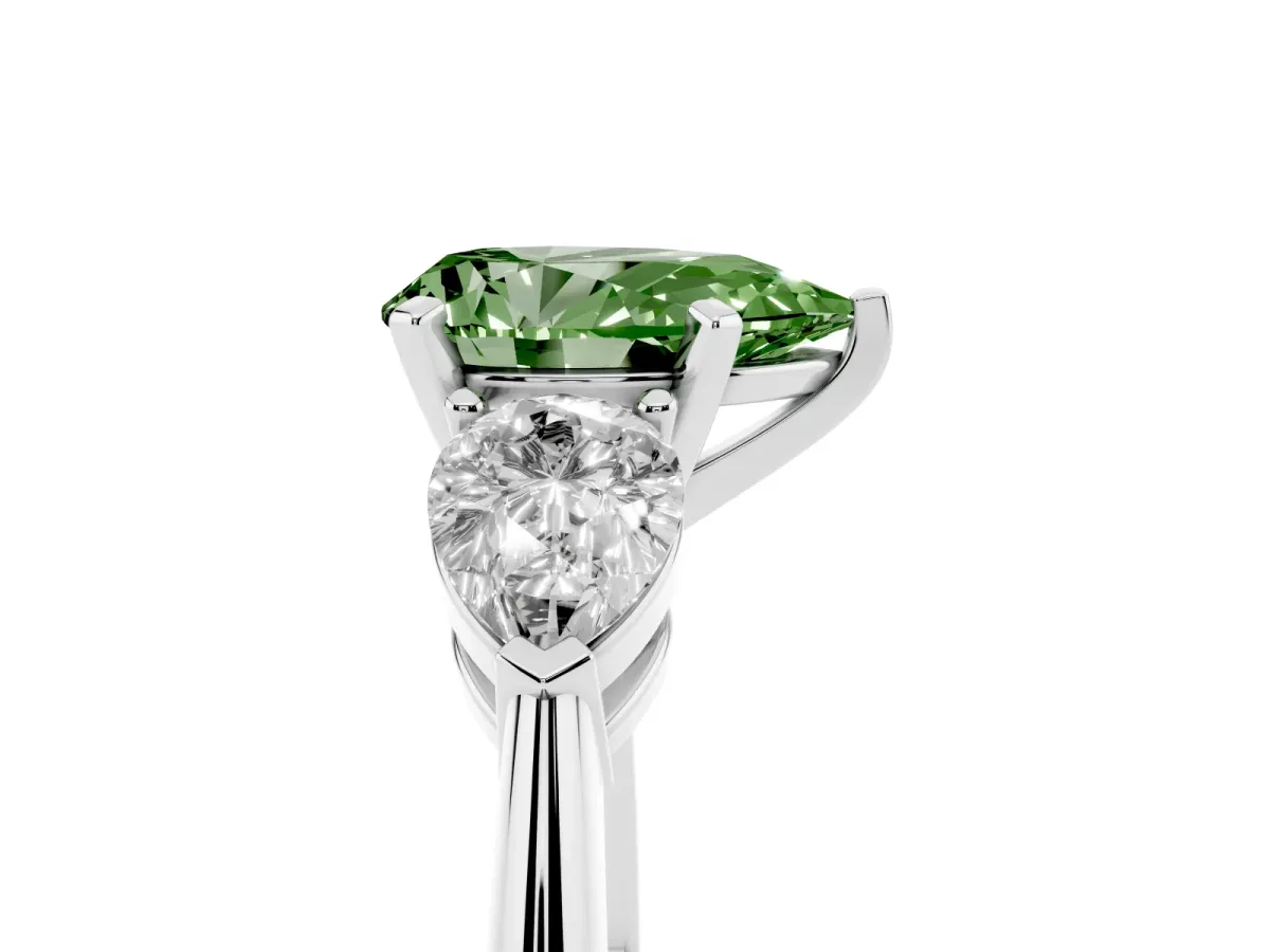 Fancy Green Three-Stone Pear Cut Diamond Ring with Pear Side Stones and Four-Prong Setting Platinum
