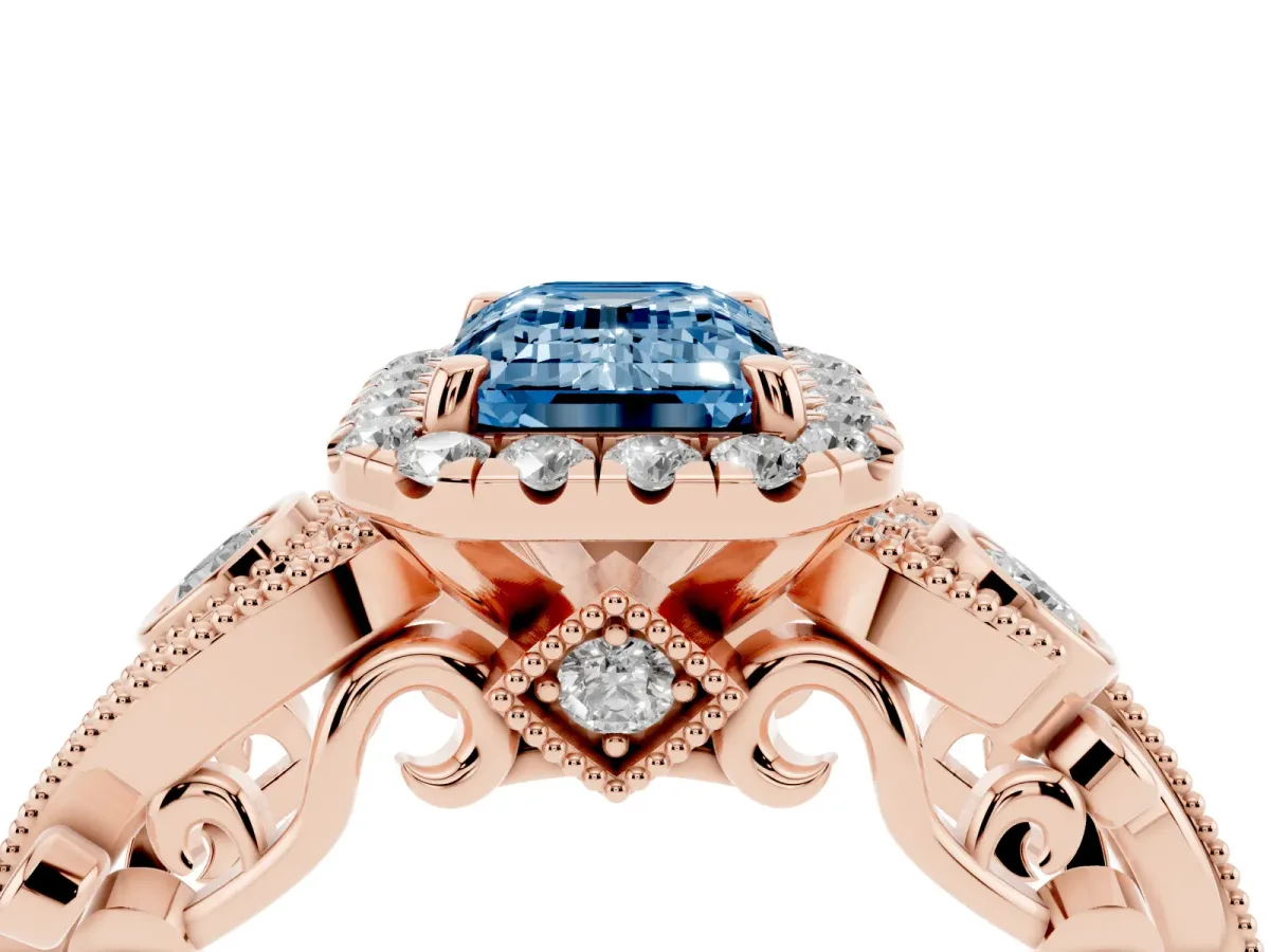 Fancy Blue Emerald Cut Halo Diamond Ring with Milgrain and Bezel Accents on a Split Shank Band Rose gold