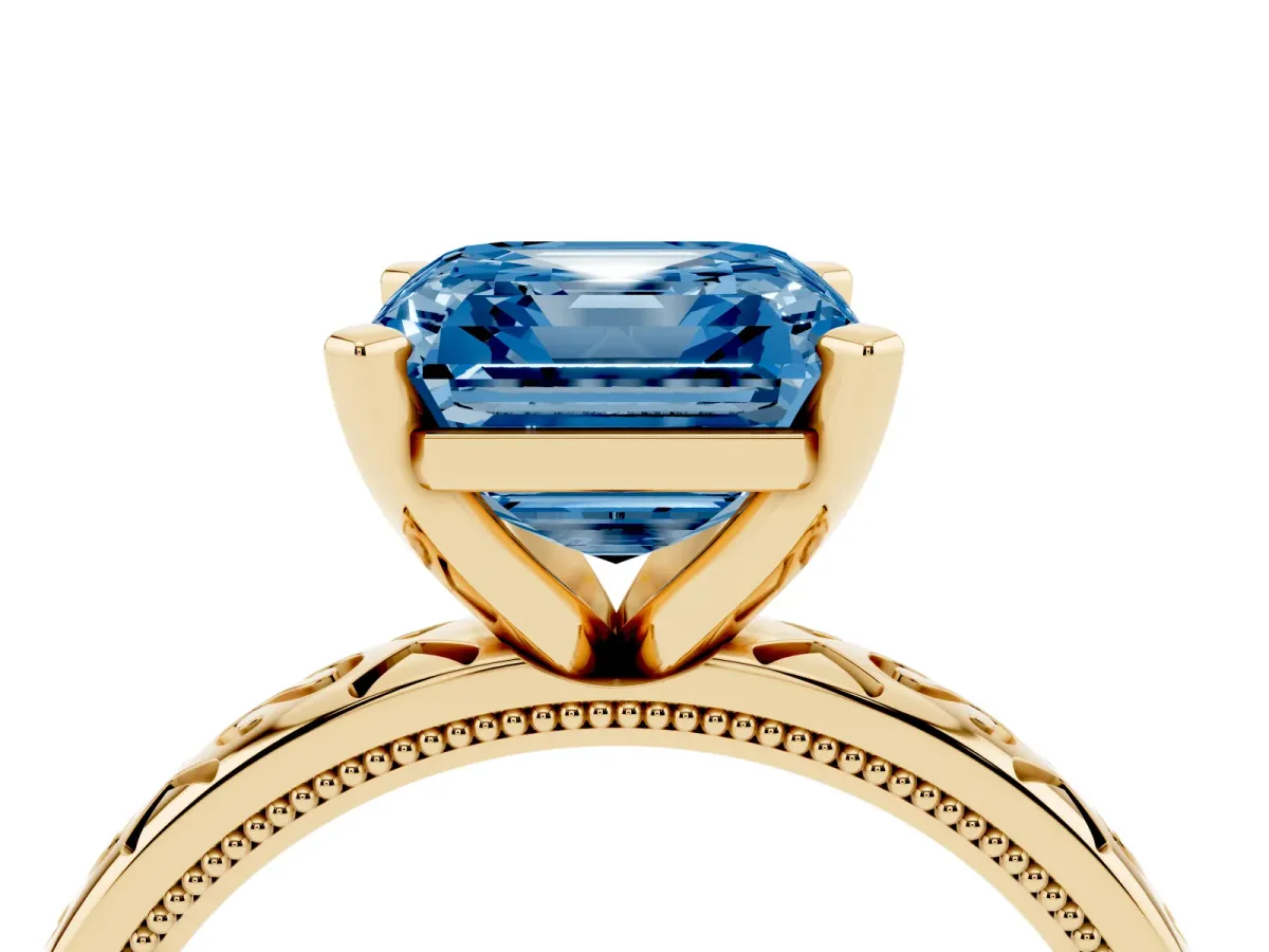 Fancy Blue Asscher Cut Solitaire Engagement Ring with Scrollwork Band and Four-Prong Setting Yellow gold