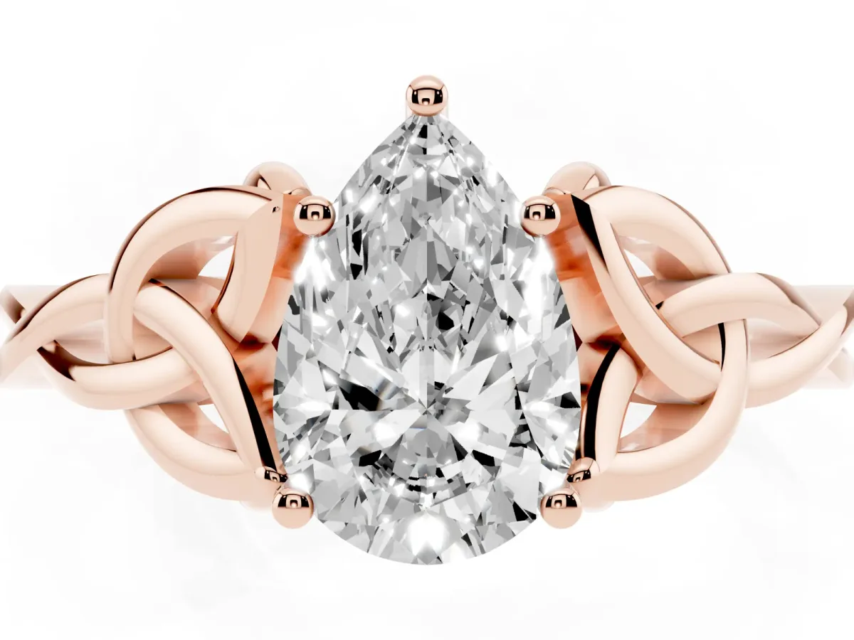 Pear Cut Diamond Solitaire Engagement Ring with Celtic Knot Band and Four-Prong Setting Rose gold