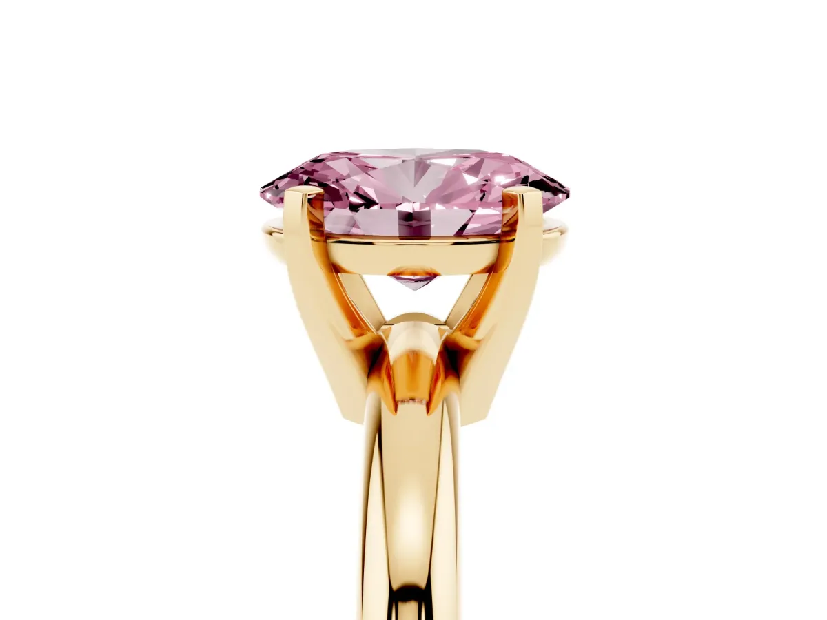 Fancy Pink Oval Cut Diamond Solitaire Engagement Ring with Round Band and Four-Prong Setting Yellow gold