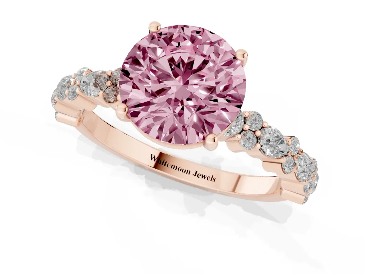 Fancy Pink Round Cut Diamond Side Stone Solitaire Ring with Round and Four-Prong Setting Rose gold