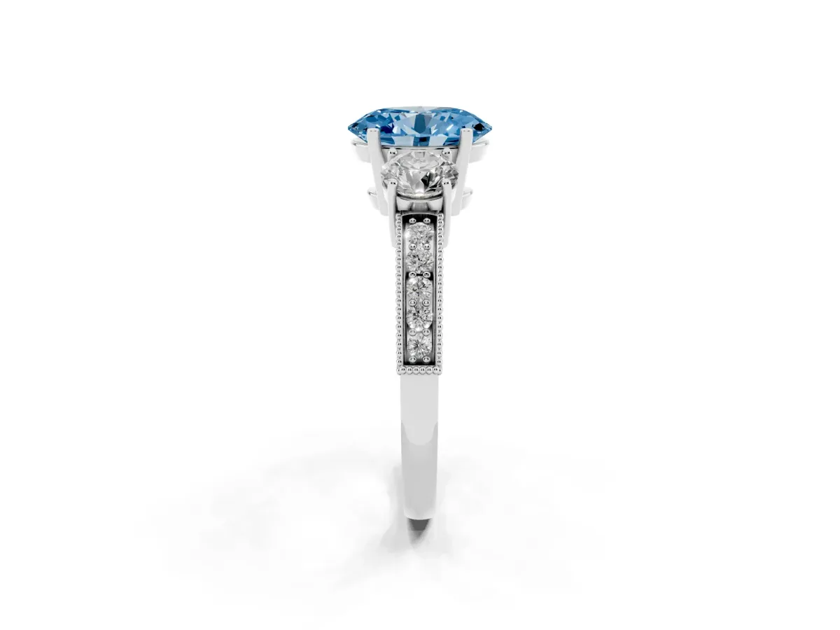 Fancy Blue Oval Cut Three-Stone Diamond Ring with Pavé Band and Four-Prong Setting Platinum