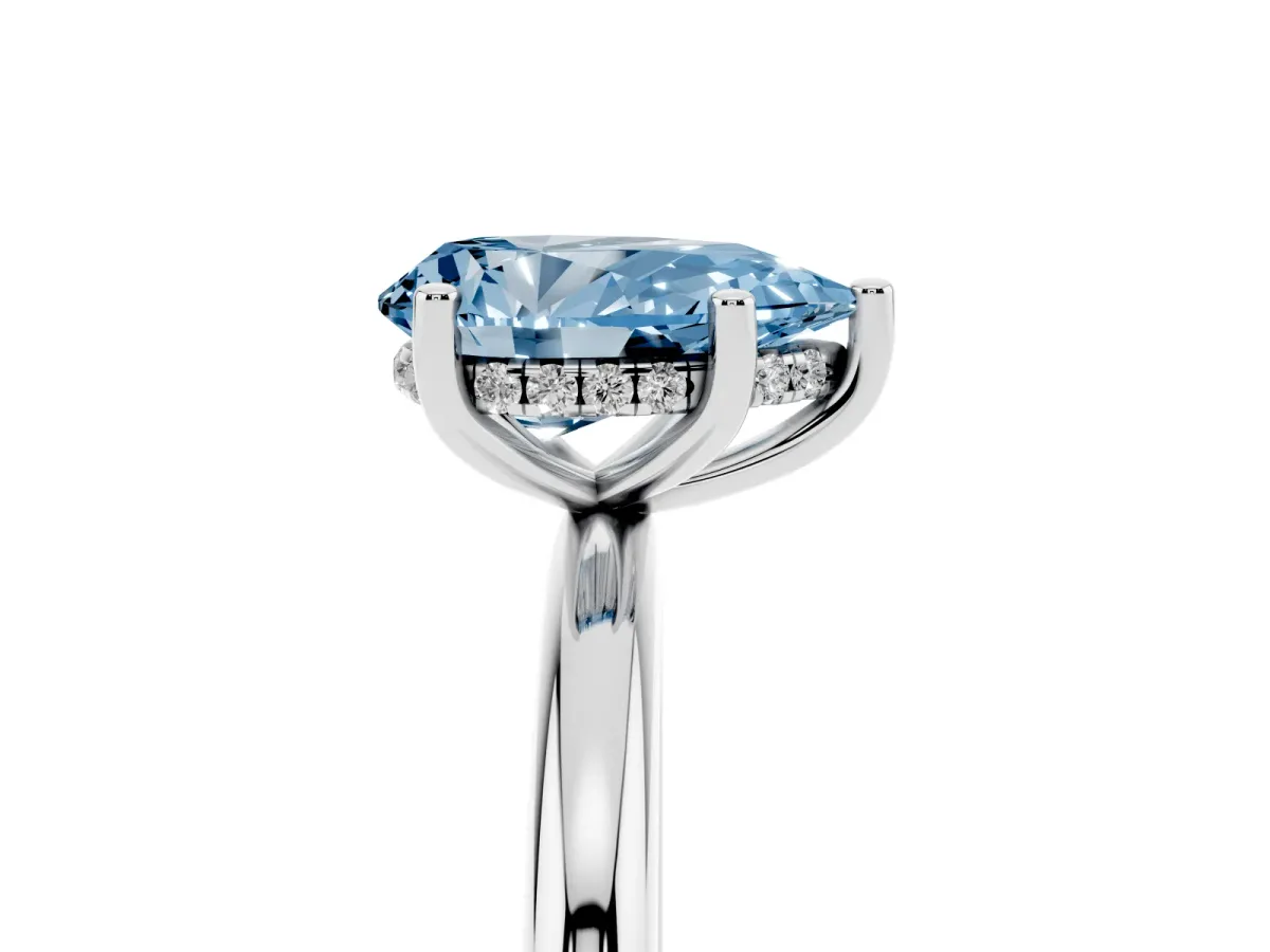 Fancy Blue Pear Cut Cut Solitaire Engagement Ring with Four-Prong Setting and Classic Band Silver