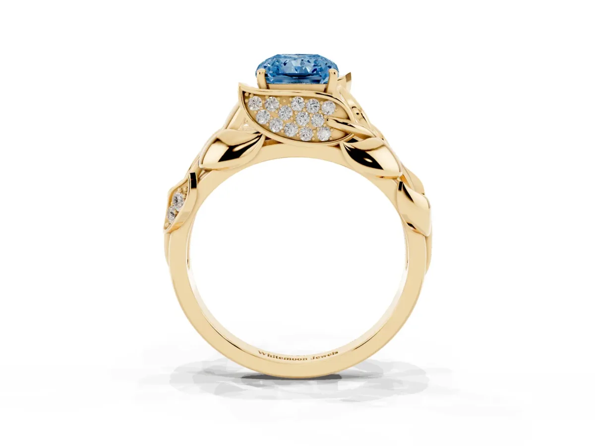Fancy Blue Radiant Cut Diamond Leaf-Inspired Engagement Ring with Round Accents and Prong Setting Yellow gold