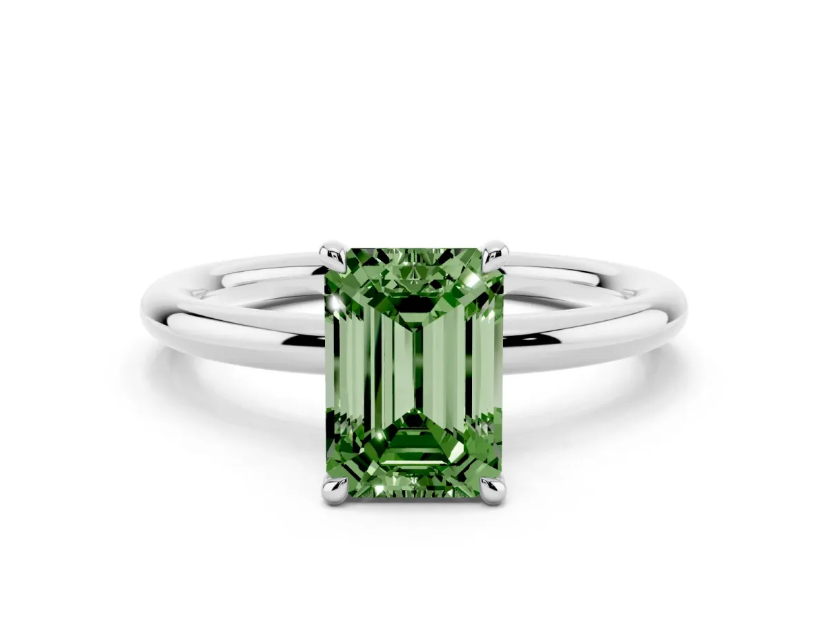 Fancy Green Emerald Cut Diamond Solitaire Ring with Thin Band and Four-Prong Setting Silver