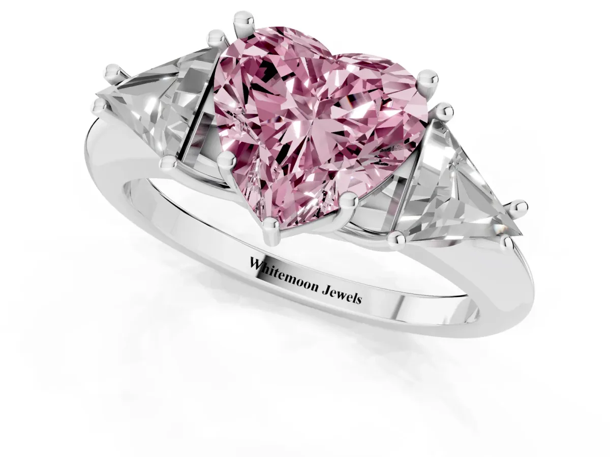 Fancy Pink Three-Stone Heart Cut Diamond Engagement Ring with Trillion Side Stones and Prong Setting Silver