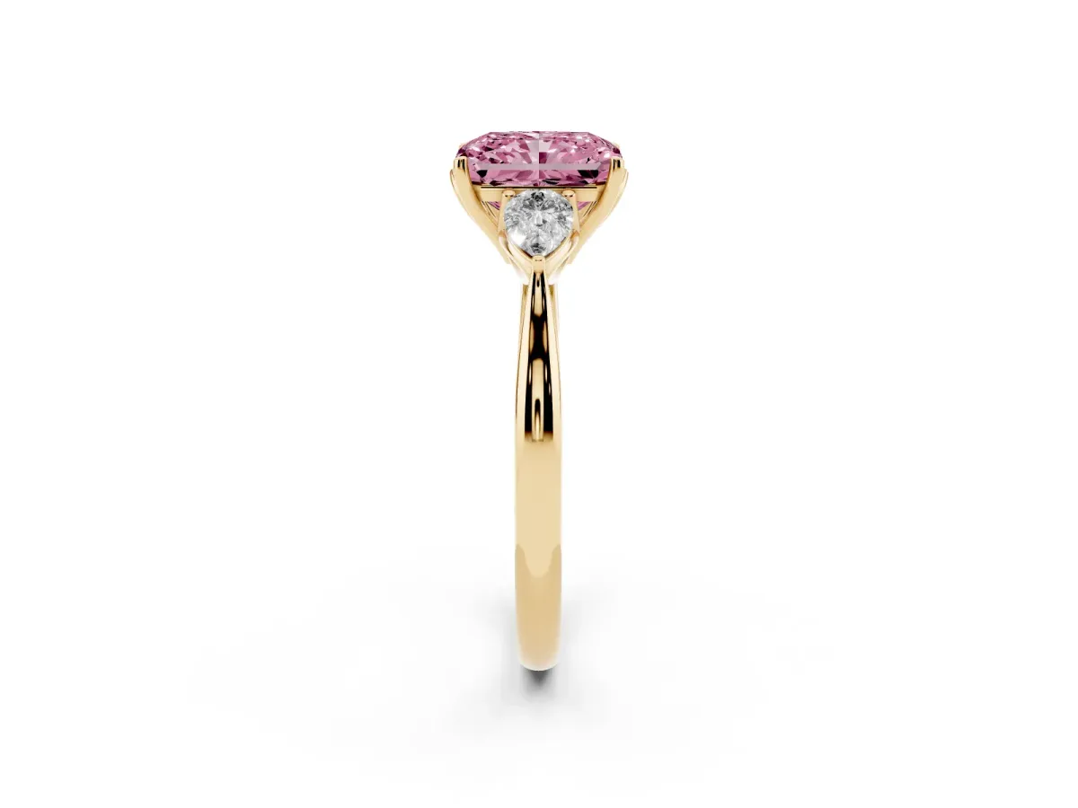 Fancy Pink Radiant Cut Diamond Three-Stone Ring with Pear Side Stones and Prong Setting Yellow gold