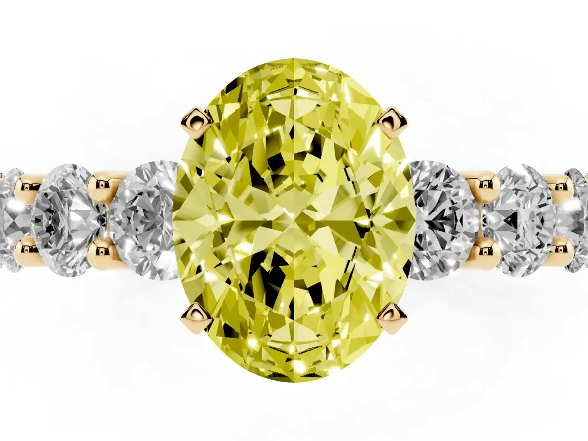 Fancy Yellow Oval Cut Diamond Prong Setting with Side Stones on a Pave Band Yellow gold