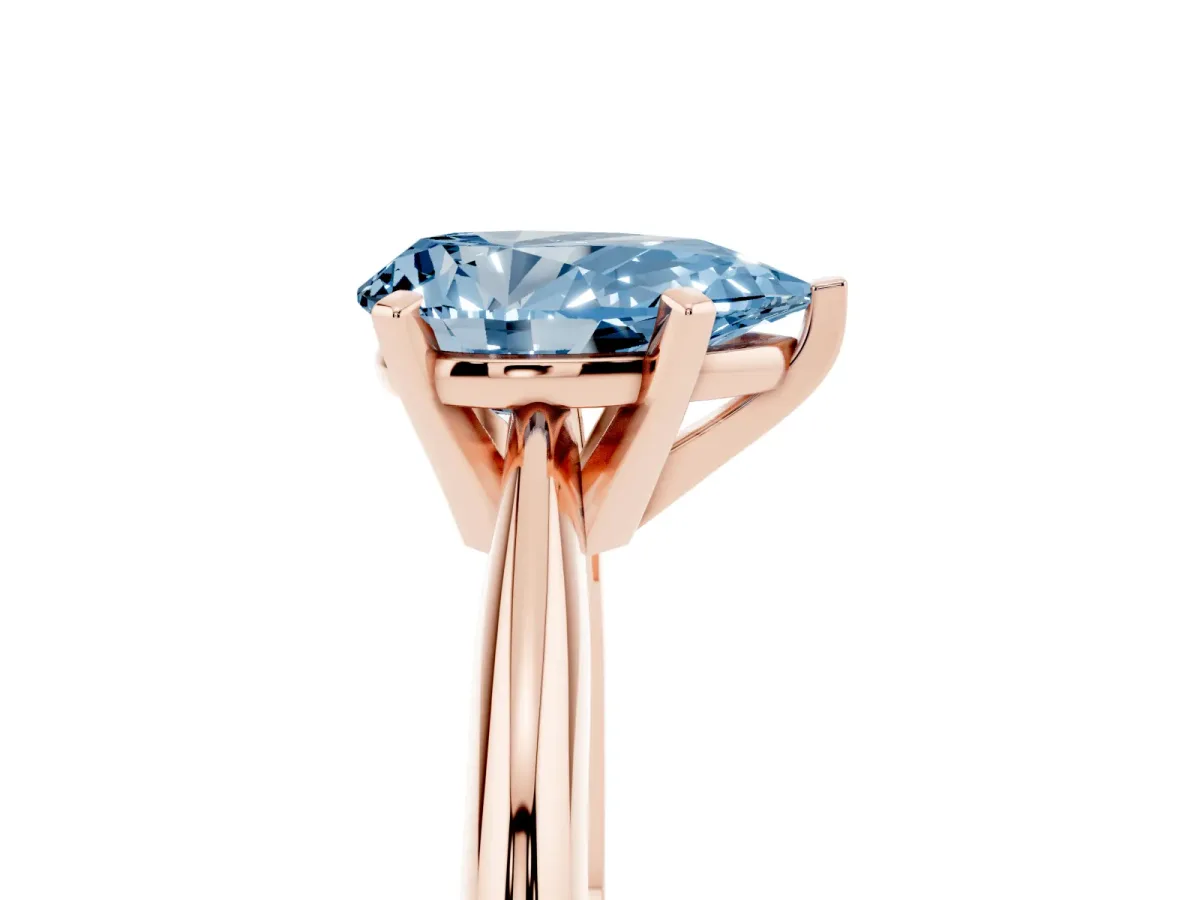 Fancy Blue Pear Cut Cut Solitaire Ring with Four-Prong Setting on a Classic Band Rose gold