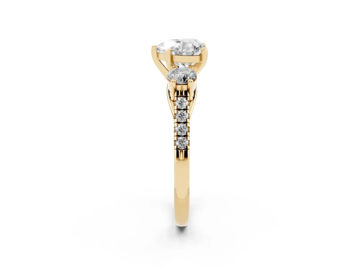 Three-Stone Heart Cut Diamond Pavé Band with Four-Prong Setting Yellow gold