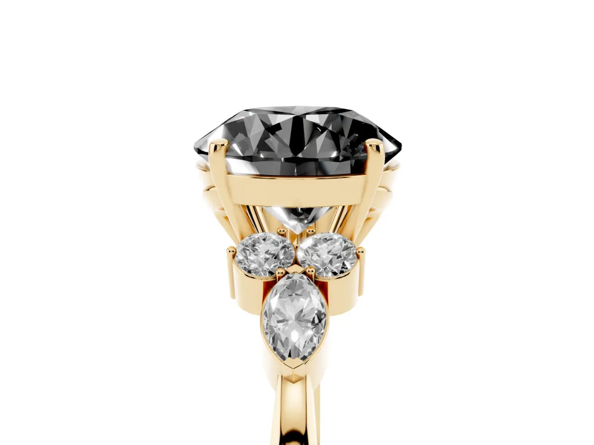 Fancy Black Round Cut Brilliant Diamond Solitaire Ring with Pear Side Stones and Four-Prong Setting Yellow gold