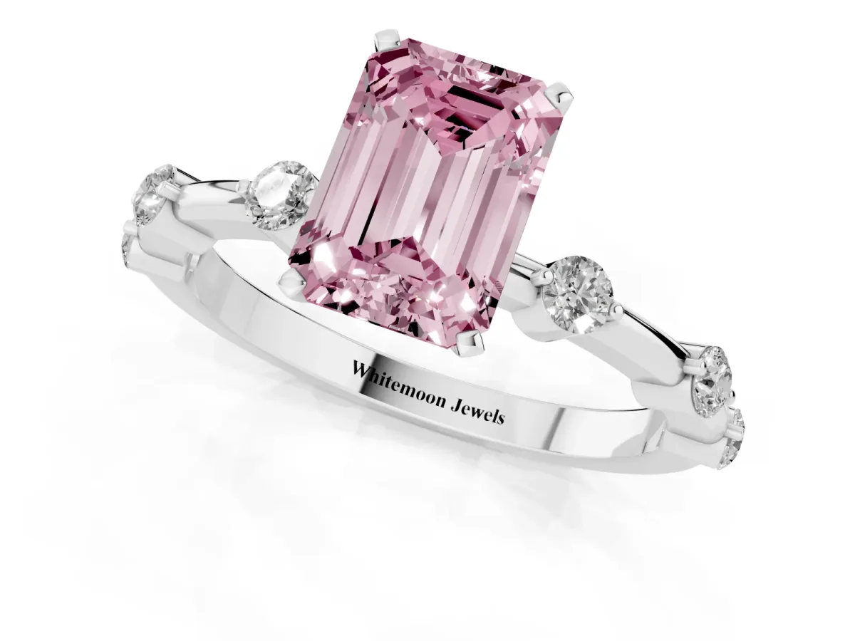 Fancy Pink Emerald Cut Solitaire Diamond Ring with Bezel Set Side Stones and Prong Setting Platinum