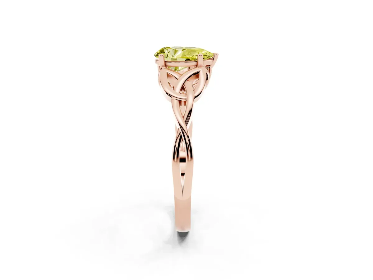 Fancy Yellow Pear Cut Diamond Solitaire Engagement Ring with Celtic Knot Band and Four-Prong Setting Rose gold