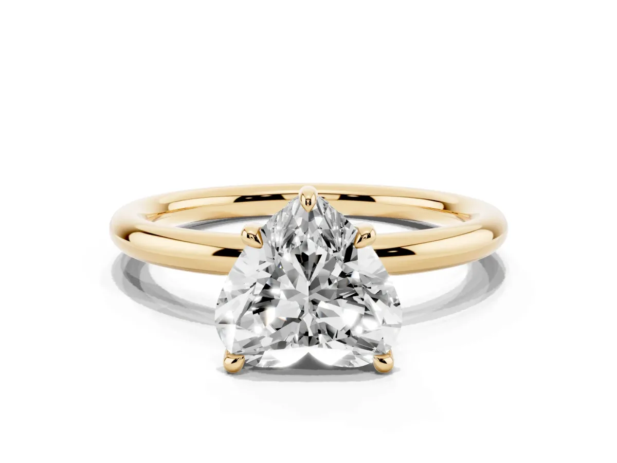 Heart Cut Diamond Solitaire Ring with Thin Band and Four-Prong Setting Yellow gold