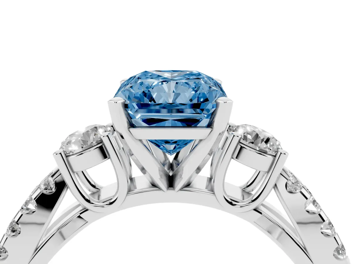 Fancy Blue Radiant Cut Diamond Three-Stone Ring with Pavé Split Shank and Four-Prong Setting White gold