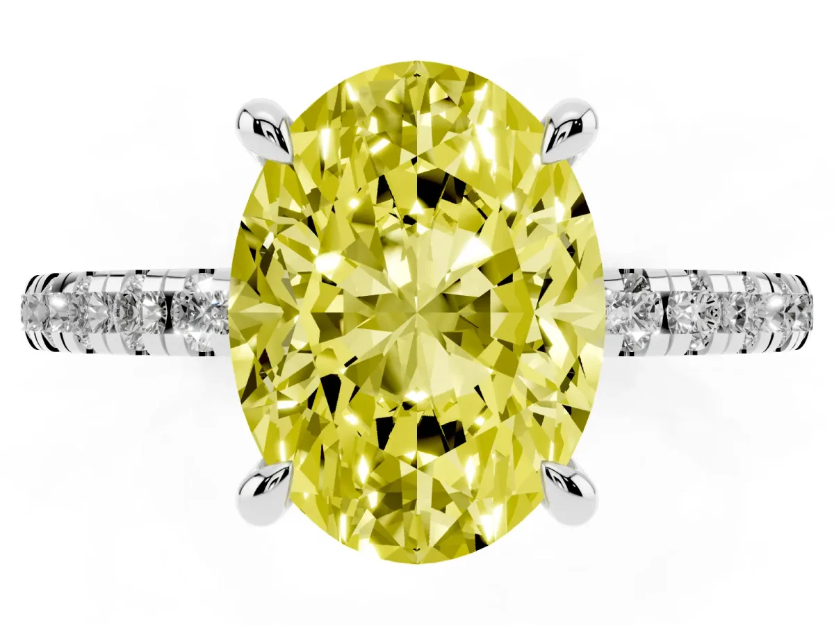 Fancy Yellow Oval Cut Diamond Brilliant Solitaire Ring with Pavé Band and Four-Prong Setting Silver